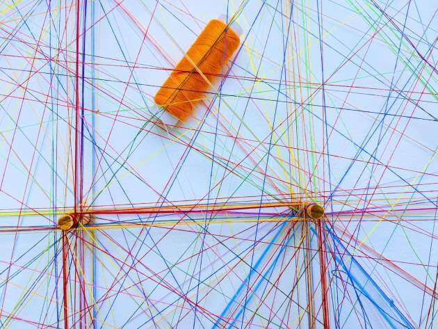 Colored string arranged in a network pattern