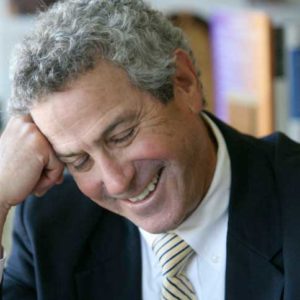 Headshot of Ira Byock laughing
