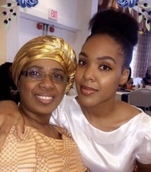 Headshot of mother and daughter in formal wear